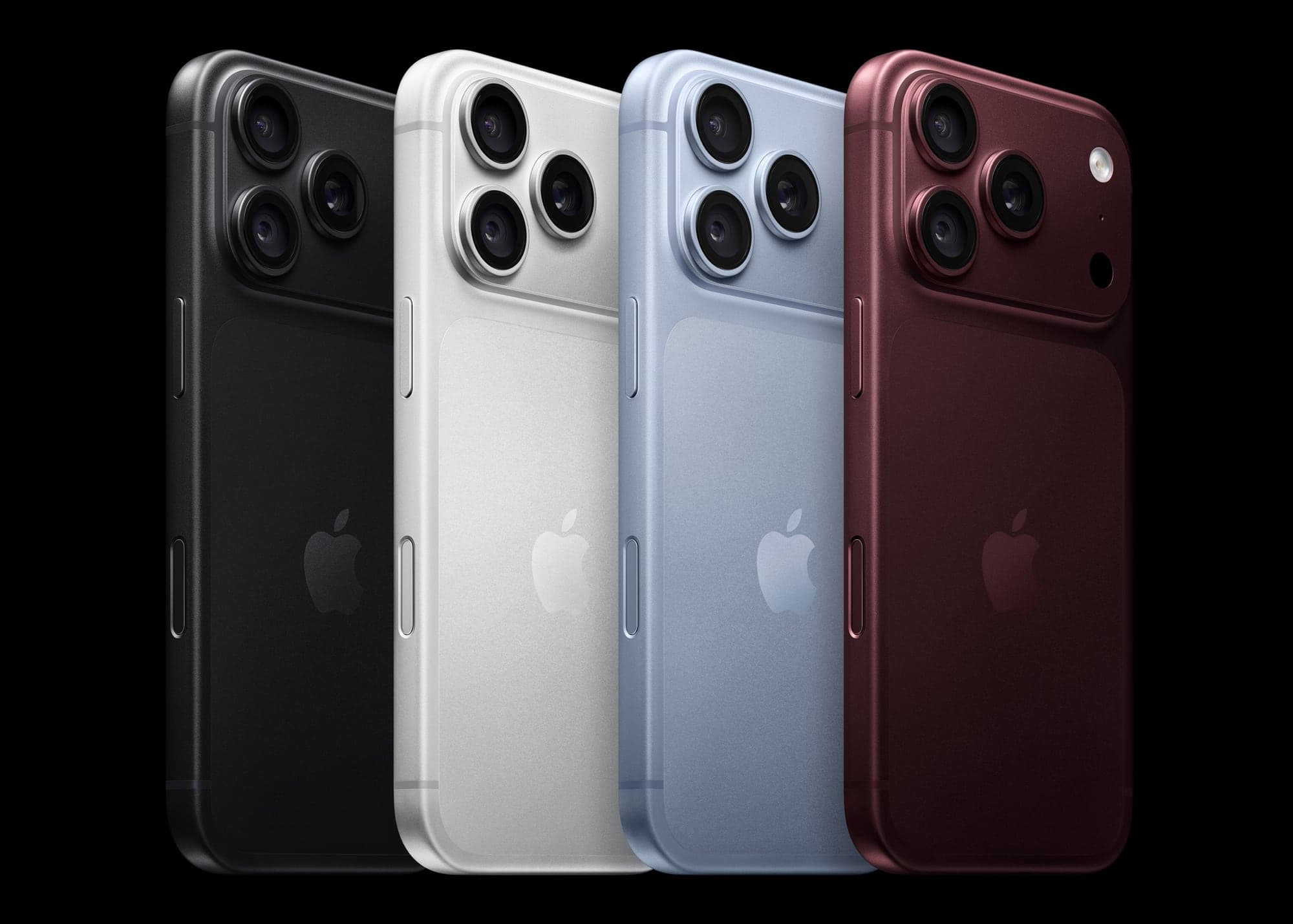 Quatre iPhone 18 Pro vus de dos, en noir, argent, glacier et bordeaux, avec leur module de trois appareils photo, sur fond noir